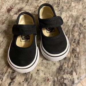 Size 2 toddler velcro closure Vans in Black. In excellent used condition.